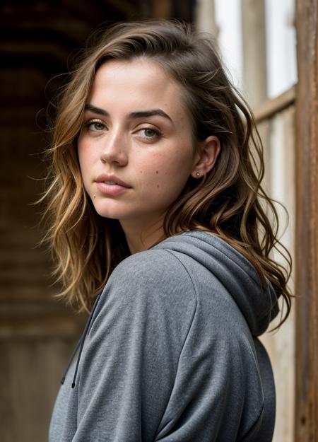 A stunning intricate color close up portrait of (anadearmas-ti:1) , wearing Hoodie and sweatpants, epic character composition, sharp focus, natural lighting, subsurface scattering, f2, 35mm, film grain, , by Annie Leibovitz