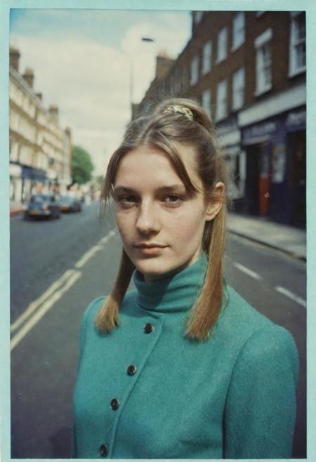 1960s swinging london style 25 year old girl, half body portrait, half-up ponytail, swinging london , polaroid 600 cor analog film, faded, direct print