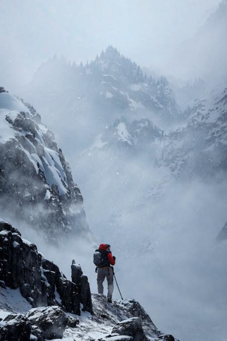 Mountain climber hiking up a mountain, snowy, cold, foggy and misty, overcast day, raytracing, detailed, rocks and ice