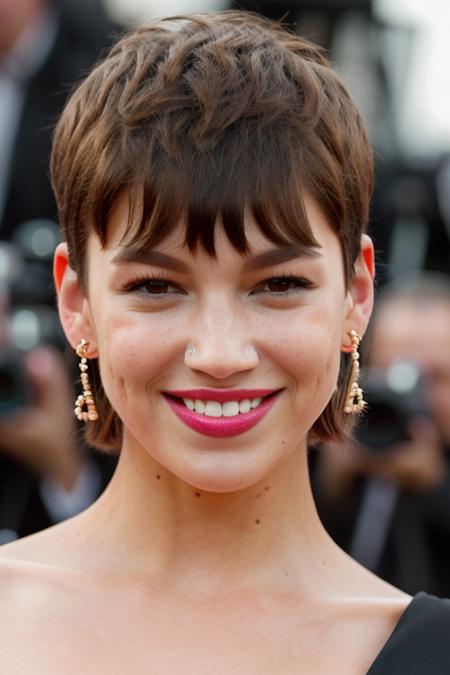 Realistic photo of a beautiful ursul4c-v1 woman, 1girl, solo, breasts, looking at viewer, smile, short hair, brown hair, dress, bare shoulders, brown eyes, jewelry, upper body, earrings, teeth, sleeveless, mole, grin, blurry, black dress, lips, depth of field, blurry background, freckles, mole on breast, realistic, nose, mole on cheek, soft lighting, professional Photography, Photorealistic, detailed, RAW, analog, sharp focus, 8k, HD, DSLR, high quality, Fujifilm XT3, film grain, award winning, masterpiece<lora:ursul4c-v1:1.0>