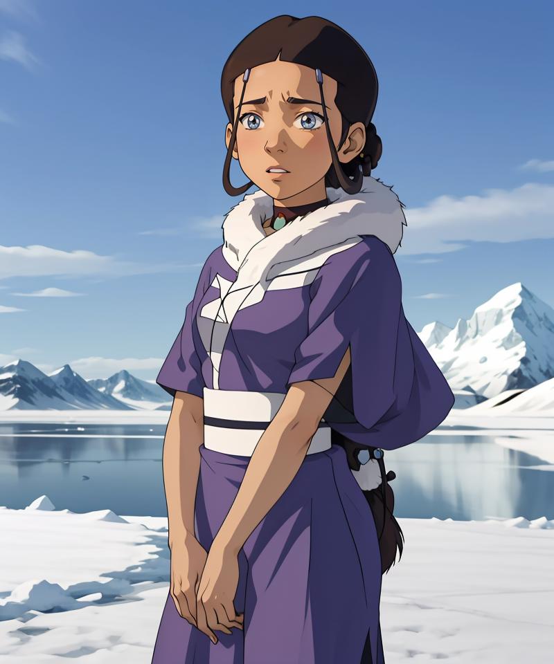 A woman with a blue dress and white belt standing in the snow.