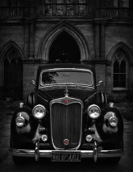 Gothic style <lora:ADM C-Car :1>,A.D.M. Cooper,car,classic,cars, . Dark, mysterious, haunting, dramatic, ornate, detailed