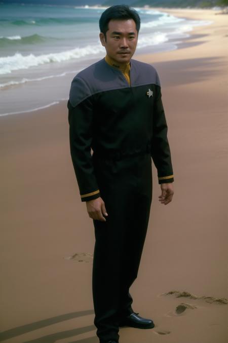 asian man in black and yellow ds9st uniform,on a beach, 8k uhd, dslr, soft lighting, high quality, film grain,masterpiece quality,Fujifilm XT3<lora:DS9_768V12:0.8>