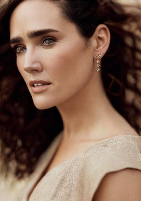 jennifer connelly (sharp focus:1.2), photo, attractive young woman, (beautiful face:1.1), detailed eyes, luscious lips, (cat eye makeup:0.85), (large eyes:1.0), (toned body:1.2), (curly hair:1.2), wearing (romper:1.2) on a (beach:1.2). (moody lighting:1.2), depth of field, bokeh, 4K, HDR. by (James C. Christensen:1.2|Jeremy Lipking:1.1).