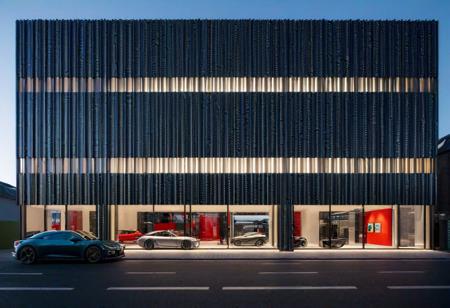 photography, dynamic view, modernism mid-scale store facade design, Canon EOS 5D Mark IV, EF 24mm f/1.4L II USM lens, set f/2.8 for a depth of field that highlights architectural photography, design should blend different materials in a way that s both innovative and aesthetically pleasing, focus on a clean composition, with sharp lines and a balanced interplay between light and shadow, archdaily style, hight contrast, highlight the facade s details and textures, like the unique patterns in the materials or the play of light through the windows, to evoke a sense of depth and realism, with an emphasis on the facade as the focal point of the composition, night, some people silhouette, car taillights, lens flare effect, photorealistic, detail of the facade s design and materials --no unreal scale --ar 9:16 --style raw --stylize 750 --v 6