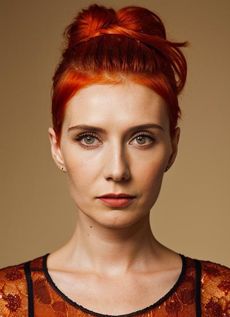 portrait of sks woman by Flora Borsi, style by Flora Borsi, bold, bright colours, orange Mohawk haircut, ((Flora Borsi)), <lora:locon_caricevanhouten_v1_from_v1_64_32:1>