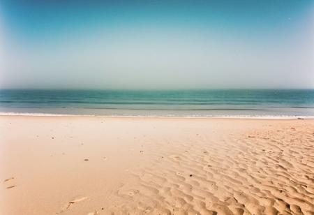 nstagram photo, a foggy beach in sri lanka, hard shadows, film grain, nstagram photo, a foggy beach, hard shadows, film grain