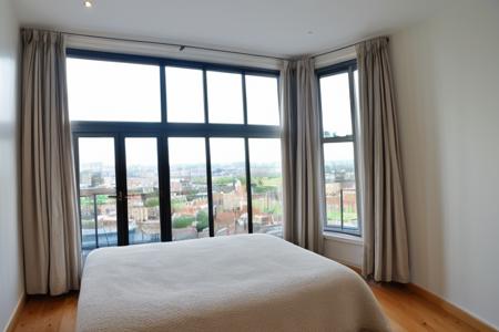 wide angle photo, ovfi, view through window, residential neighbourhood, london, bay windows,  large windows, <lora:buildings view from indoors_epoch_9:0.5>, <lora:add_detail:0.5>, RAW photo, 8k uhd, dslr, soft lighting, high quality, film grain, Fujifilm XT3, lr