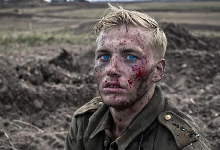 1 man, world war 2 soldier on the Eastern Front, (dying), (explosions), face in shadows, vivid colors, black and white, bright blue eyes, bloody face, bleeding out, exhausted, German Soldier, blonde hair, 1940s haircut, muddy field, bleak landscape, last moments, <lora:Desolation:1.1>