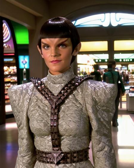 romulan, female, emma watson, pointy ears, medium olive skin, perfecteyes eyes, v-shaped brow ridge on forehead, short bob hair with straight bangs, wearing red lipstick, slight smile, wearing romulan uniform, wearing belted harness, silver clothing, walking in a shopping mall, raw photograph, wide shot, <lora:romulan_lora:0.8>,  <lora:locon_perfecteyes_v1_from_v1_64_32:0.2>