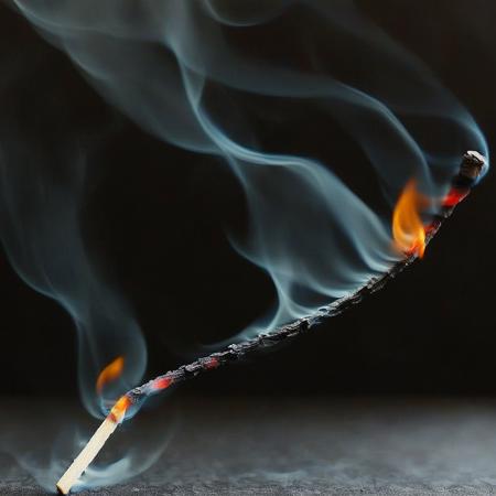 <lora:SDXL_black_and_color_Sa_May:1>  a matchstick with a smoke