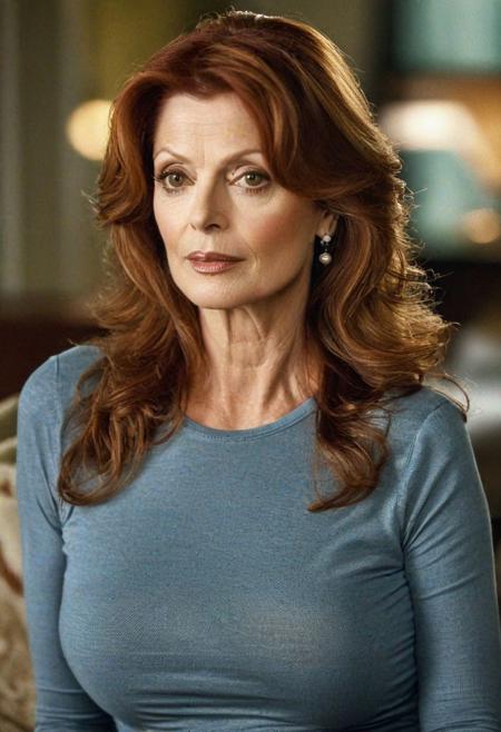 cinematic film still, ((professional photography)), ((masterpiece)), (((photorealism))), perfect focus, centered, medium shot of beautiful, mature, long-haired,  busty, well-endowed, Susan Sarandon looking to camera, (wearing tight T-shirt reading "GILF UNIVERSITY":1.3), (tight jeans:1.3), (very well-endowed:1.3), ((very long auburn hair:1.3)), natural skin, professional makeup, glossy lipstick, (soft, warm studio lighting:1.3), professional photography, Nikon 35mm lens, bokeh, diffused light