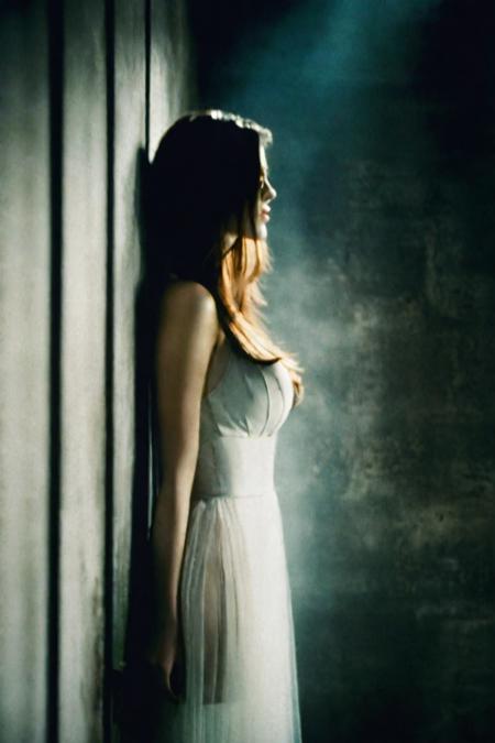 by paolo roversi, room, girl, large breasts, long hair, light from a spotlight on the wall, light and shadow, fog, abstraction,