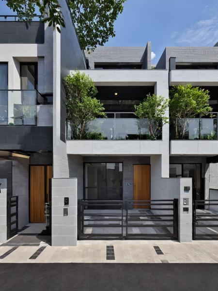 Architectural style, <lora:JJsRowHouse_XL:1>,(masterpiece) , (best quality), ((RowHouse)), dramatic lighting, high quality outdoors, sky, day, cloud, tree, blue sky, building, scenery, road, real world location,  sunlight, enough detail, high resolution,super realistic, Photorealistic, highly detailed, balcony, plants, door, gate, paving, . Clean lines, geometric shapes, minimalist, modern, architectural drawing, highly detailed