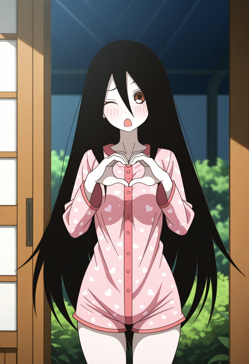 A young woman with brown eyes, very long black hair, and a winking, standing in an open doorway, making a heart shape with her hands over her chest. She is wearing a matching set of pink, long-sleeved, button-down pajamas with a white heart pattern. The background visible through the doorway consists of green foliage and a white and black wall.