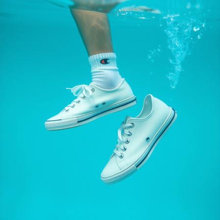 professional photo, (high detail),
woman in a swimming pool wearing sneakers and white socks, sneakers underwater water, sneakers floating, sneakers sinking, wet sneakers
 (((white-canvas-Keds-Champion-sneakers))), (((Keds-sneakers-from-the1960's))), (((very-very-thin-rubber-soles))), (((sneakers-with-very-very-thin-rubber-foxing))), (((sneakers with-white-foxing-stripe))), (((sneakers-with-very-long-pointed-toes))), no-toe-bumper, no-heel-bumper
(realistic:1.8), (((visible sneakers, detailed sneakers)))