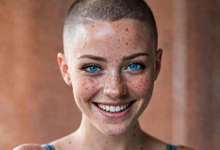 beautiful lady, (freckles), big smile, blue eyes, buzzcut hair, dark makeup, hyperdetailed photography, soft light, head and shoulders portrait, cover as laracroft