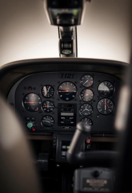 A beautifully composed professional photograph of a Cessna 172 instrument panel