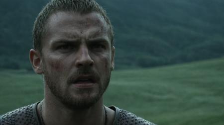 Film Grain, FilmGrainAF, scene from vikings, outdoors, close-up, angry expression, eerier, dramatic lighting, dark atmosphere <lora:add-detail-xl:2.0> <lora:FilmGrainRedmond-FilmGrain-FilmGrainAF:1>