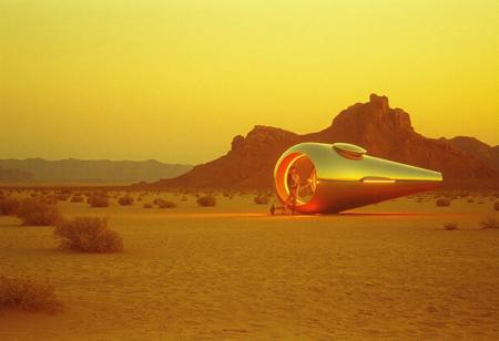 avant-garde, retro futurism , gold and chrome, california desert, 1970s, robert T, techno style