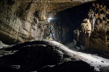 <lora:sondoong-000010:0.8>, cave, sondoong, plant, ((Helmet, Headlamp, Knee pads, Gloves, Boots, Climbing gear, Harness, )), 
1girl, a stunning photo with beautiful saturation, ultra high res,(realistic:1.4)),deep shadow,(best quality, masterpiece), pale skin, dimly lit, shade, flustered, blush, highly detailed, ((upper body:0.8)), skinny, BREAK depth of field, film grain, wrinkled skin, looking at viewer, knee,  warm smile,, (masterpiece,best quality:1.5)