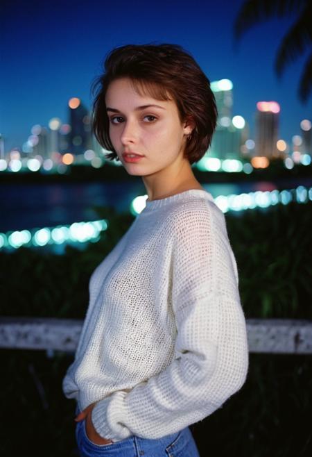Dani3ll4Rush, Daniella Rush, <lora:Dani3ll4Rush-sdxl:1>, 1girl, sweater, solo, short hair, realistic, looking at viewer, bokeh, focus, film, velvia, artistic, best quality, photograph,  city skyline, nighttime, bokeh, miami, detailed, tropical, vice, 1988