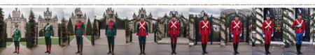 RAW photo, a portrait photo of 20 y.o man wearing glasses, (wearing christmas toy soldier costume), (standing straight next to the castle gate), out door, full body, 8k uhd, high quality, film grain, Fujifilm XT3, <lora:christmas_toy_soldier_costume-02:0.1>