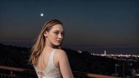 RAW photo, a photograph of e3fj4h standing next to a balcony, sj0kz123 looking over a moonlit city, (high detailed skin:1.2), 8k uhd, dslr, soft lighting, high quality, film grain, Fujifilm XT3 <lyco:Test11Sj0kz:0.5>  <lora:LowRA:0.6>