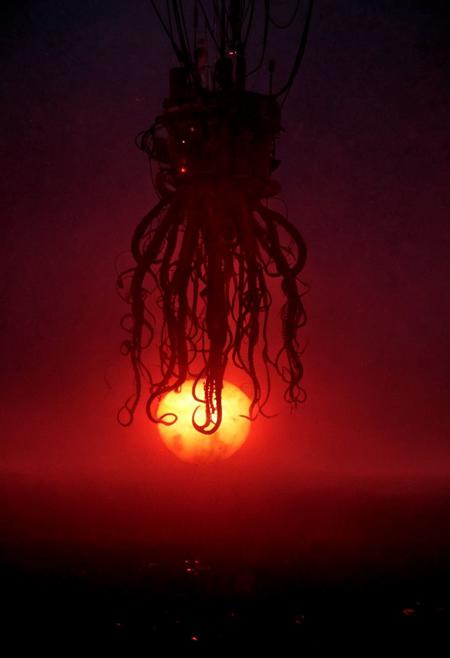 DOCUMENTARY thermal vision photo strapped into a machine that is floating through the sky with long cable-like tentacles grabbing victims from the sky, rapture, extremely dark scene with a faint red sun barely shines through the cloud cover, extremely detailed, a24 cinematography , thermalvision style