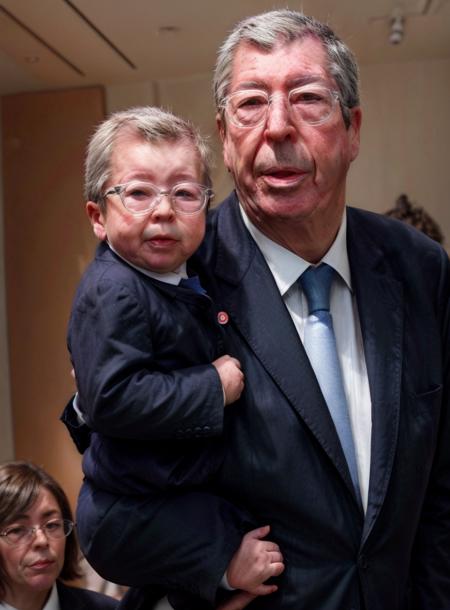 Realistic style ,  <lora:Patrick Balkany:1> , Patrick Balkany , carrying a baby