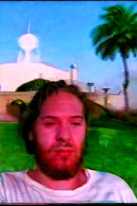 (upper body and face of <ffurian> male character 1.5), (pose: pointing finger into the sky 1.7), (ffurian man with beard 1.1), (ffurian wearing white t-shirt 1.0), (brazilian beach, palm trees background 0.6), (ffurian man with beard 1.1), (sunny weather 0.4) BREAK Weirdcore (y2k aesthetic 0.8), ms paint style, the matrix movie, 3d render, half0ster, VHS, VHS footage of