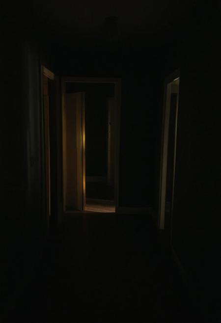 The room gradually transforming into a dark, twisted version of her reality, with shadows creeping closer, symbolizing her entrapment
