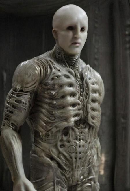 Engineer1024, cinematic movie still of the Prometheus movie by Ridley Scott, a bald pale semi-alien male with black eyes, ivory bio-metallic-bone armor inspired by H. R. Giger, extremely detailed pale skin with visible respiratory pores, in a dynamic pose,
extremely high quality RAW photograph, exquisite details and textures, highly detailed, ultra detailed photograph, dramatic cinematic lighting, 4k,
highest resolution, (bokeh:1.3), (best quality, masterpiece:1.3), ultra high res, 16k unity wallpaper, intricate details, highest detailed, sharp focus, extreme shadow-play, low key, backlit, (filmgrain:1.3)
dramatic full body shot, wide angle view
ancient ruins of an otherworldly alien planet , dusty atmospheric haze, mesmerizing fog, dark pastel colors
<lora:add-detail-xl:1> <lora:xl_more_art-full_v1:0.5>  <lora:Engineer1024:0.6>