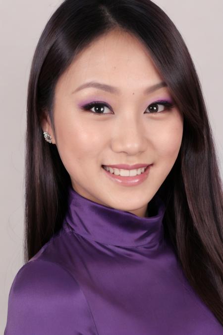 Portrait photo of ev3lynl1n, purple turtleneck blouse, makeup, smiling