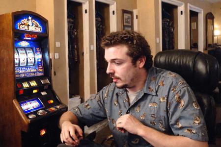 <lora:XL_bossmanjack_v4:1>,  <lora:XL_Oil_Paint_ClassipeintXL1.9:0.7>, (((oil painting))), solo,  cat themed slot machines on right, 1boy, male focus, facial hair, solo brown hair, young man in a cat themed casino,