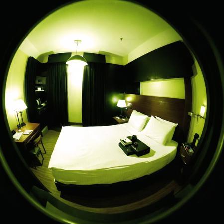 <lora:fisheye2:1>, fisheye, 

 hotel room bed, dark, horror, creepy, creepy-looking, lovecraftian,, overexposure, video distortion,