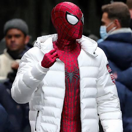 tasm2spdrmn wearing (white:1.25) puffy jacket <lora:tasm2spdrmn_v4:0.75>