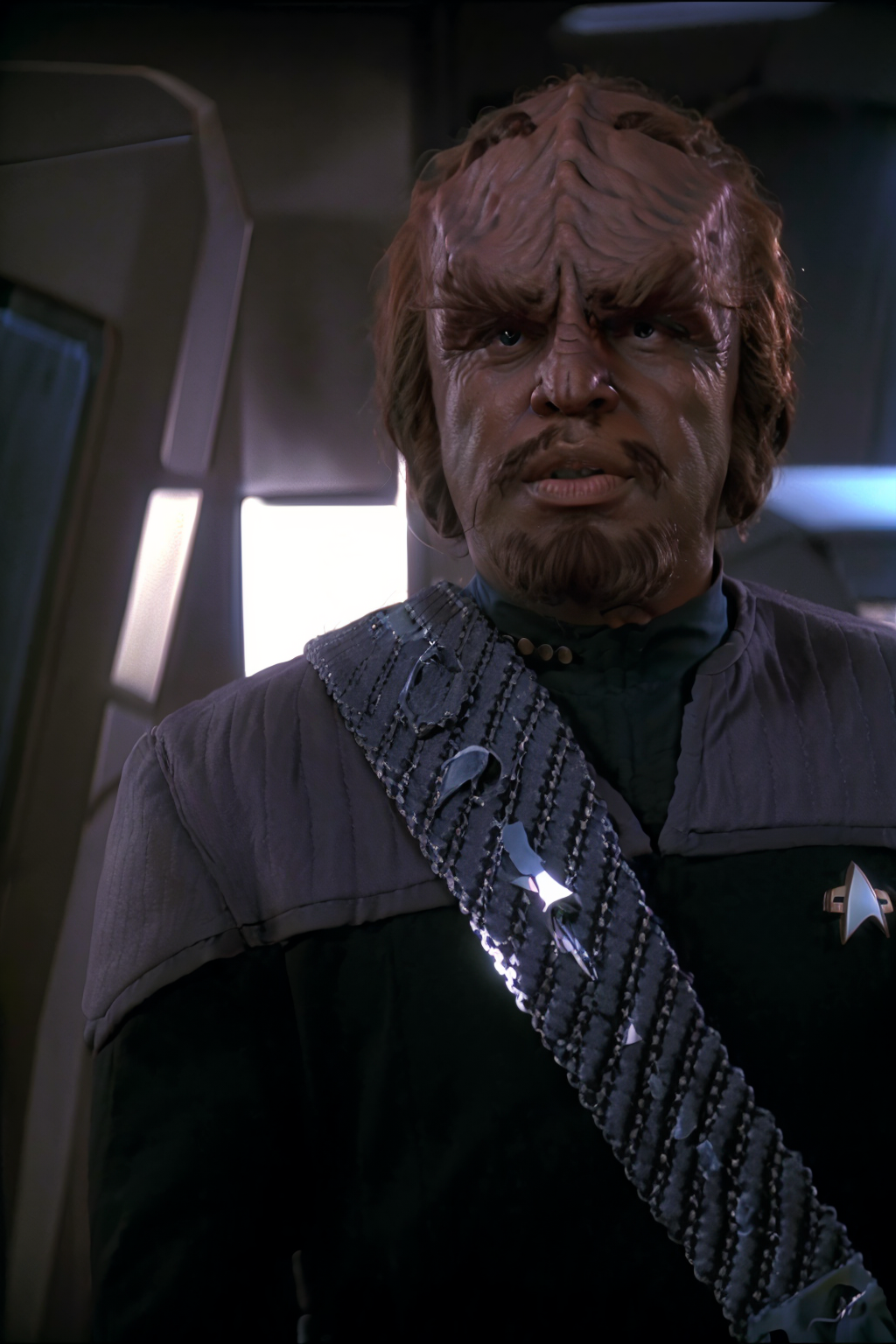 00106-headshot_of_a_klingon_man,_forehead_ridge,_thick_eyebrows,_dark_skin,_wearing_black_and_blue_ds9st_uniform,__(blue_collar_1.1),_-1671560533.png