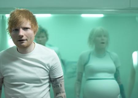 Edsheeran person in an alien spaceship medical ward being treated by bizarre pregnant cyborg women who think he is pregnant. ((screaming edsheeran person)). Science fiction lighting and style. Scene from /"Aliens"/