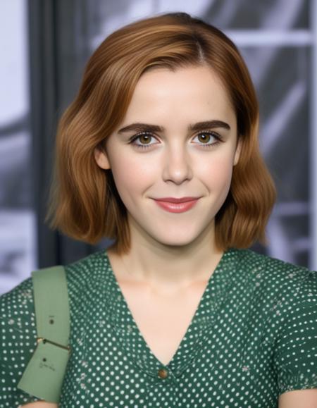 KiernanShipka,<lora:KiernanShipkaSDXL:1>,An image of a woman with shoulder-length auburn hair and fair skin. She has green eyes accentuated with mascara, and a natural lip color. She is wearing a dark V-neck blouse with a small, light polka dot pattern, short sleeves, and is accessorized with a thin, light-colored belt around the waist. The background should be a soft-focus natural setting, with hints of greenery suggesting a bright, outdoor scene.