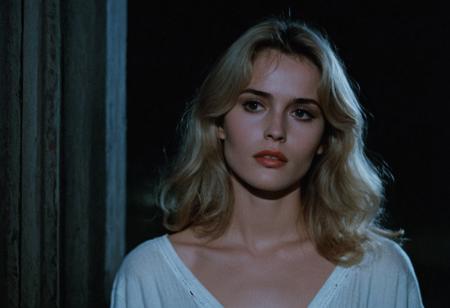 cinematic, 1980s film, close up, of a ((terrified)) young slim woman standing in a dark, dimly lit, moonlit lighting, cool tones, alley, at night. A youthful face with a fair complexion, soft and slightly rounded features, high cheekbones, and wide, expressive eyes with thick lashes. Naturally arched eyebrows complement the expressive eyes. Full lips, often slightly parted, conveying a delicate and fragile appearance. Her hair is in a short 1980s hairstyle, blonde hair with a slight wave, slightly tousled and natural, parted in the middle, with some volume at the roots, capturing a casual yet stylish vibe. She is wearing only a white cotton nightgown. cool tones. Her name is Tina and she is being stalked in her dreams by a horribly burnt man wearing a old hat and sweater with knives for fingers.