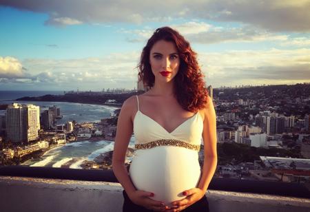 24 year old, small breasts, Mahogany beach waves, New Zealander real world location, red eyes, fair skinned, best quality, RAW photo, subject, 8k uhd, high quality, photorealistic, gilded, Rooftop terrace with panoramic city views, Wide aperture shot, <lora:add-detail-xl:0.1> <lora:pregnantXLrd:0.85>, pregnantxlrd, 1girl, solo, looking at viewer, navel, parted lips, midriff, realistic, pregnant, belly grab, hands on own stomach