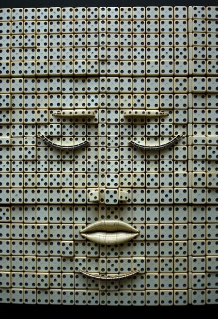"A flat, two-dimensional face is composed entirely of dominoes, each one precisely placed to form the features of a serene and enigmatic visage. The dominoes are arranged in a mosaic pattern, with each tile bearing a subtle gradient of shading to create a sense of depth and dimension. The face's expression is calm and introspective, with a hint of mystery. The dominoes are so intricately arranged that the face appears almost lifelike, as if it might topple or change expression at any moment. Style: detailed, intricate, and mesmerizing, with a focus on capturing the unique texture and pattern of the dominoes."