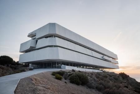 RAW photo, architecture photography, <lora:FormFinder-XL_v2:0.68>, retro-futuristic museum in coast of Spain, form inspired by brutal architecture, early dawn shot white sky, diffused light, ((blind facade)), long exposure, super realistic, 8k, professional photography