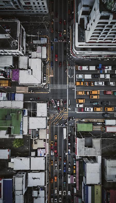 busy city street <lora:DD-above-v1:1> above