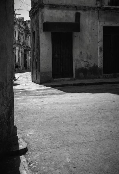 leica sl2-s, photo of a  Havana street corner, strong natural lighting,high contrast, ray og light, light on the eyes, hard shadow, ENF, Cover