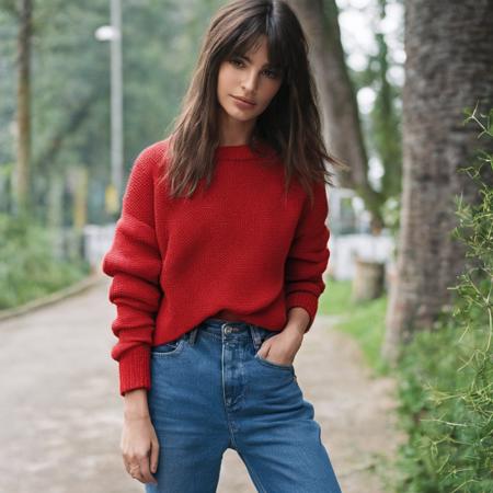 cinematic photo RAWphoto \(medium\), (emrata (woman_\(class\)):1) \(subject\), in a (red crop sweater and jeans) \(clothing\), (simple background, portrait) \(style\), (highres, best quality, full sharp, 4 k photography) \(quality\) <lora:emrata_v2:1.0> . 35mm photograph, film, bokeh, professional, 4k, highly detailed