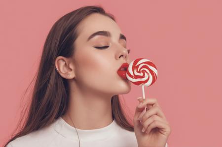 <lora:add-detail-xl:2.0> (album cover:1.3), minimalistic, (aesthetic:1.2), a girl sucking a lollipop,