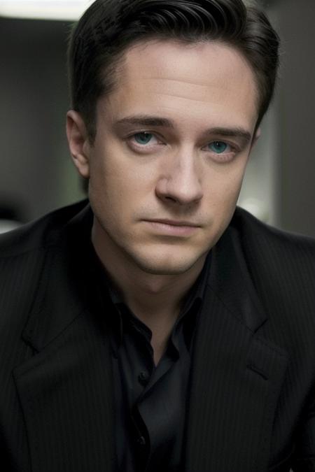 a man in slick black business suit, 23 years old, 26 years old, <lora:topherGrace:1>, villain, lab in background, looking at camera, dark cinematic lighting, [smiling, angry], ready for action, 8k, raw, uhd, close up, perfect face, clear eyes