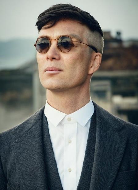 <lora:Thomas Shelby:1.1>, A stunning full body intricate full colour portrait of (man:1), (sunny, wearing sunglasses, stroll by the seaside, wearing a white shirt and shorts)
epic character composition, 
by ilya kuvshinov, alessio albi, nina masic,
sharp focus, natural lighting, subsurface scattering, f2, 35mm, film grain